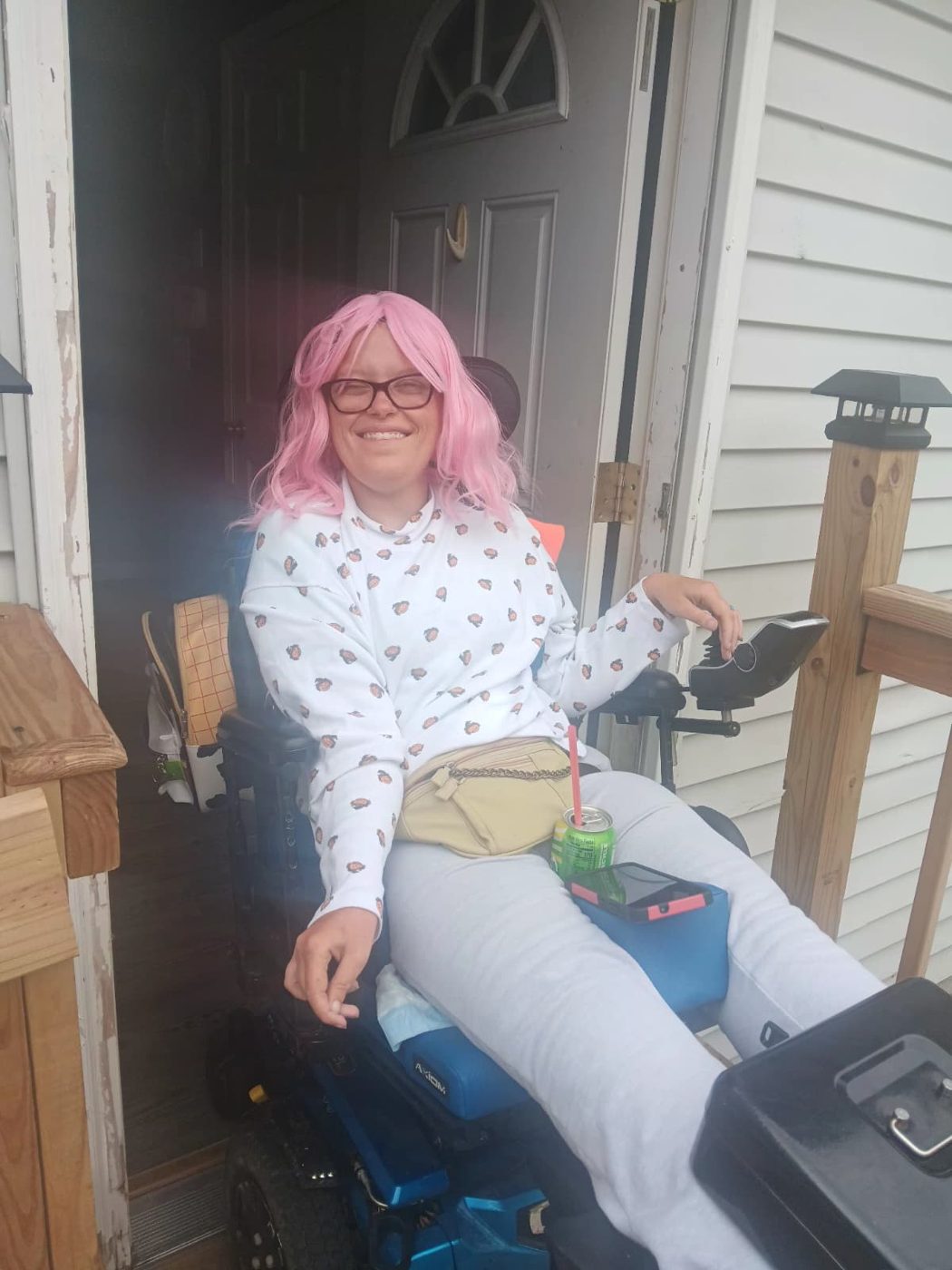 A community member sharing a smile at home